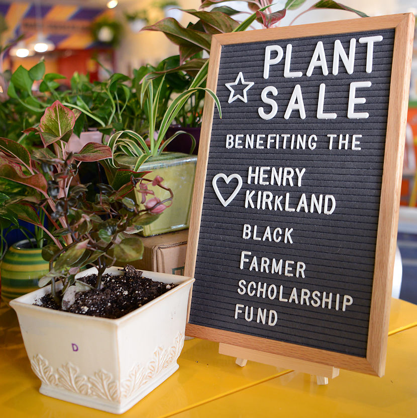 Sign advertising the plant sale to benefit the Henry Kirklin Black Farmer Scholarship Fund
